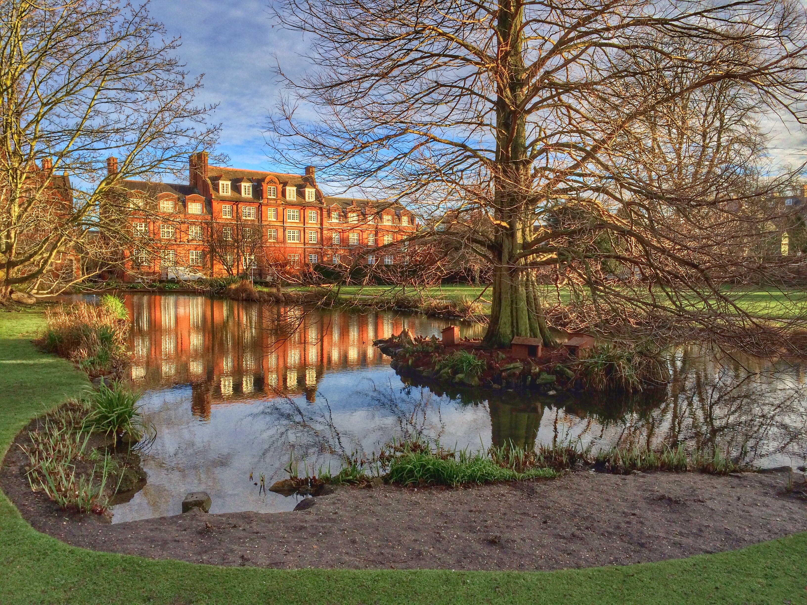 Emmanuel College featuring image of college building and pond